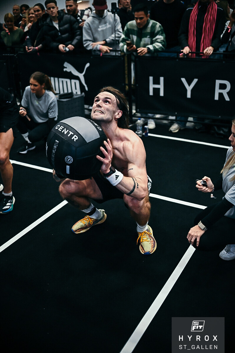 Competing at Hyrox St. Gallen wall ball throw