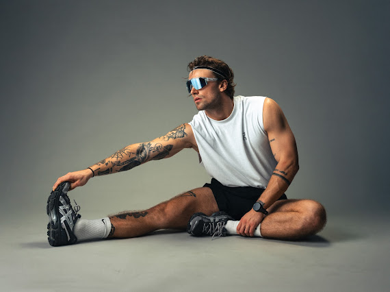 LP Coach in a studio stretch portrait